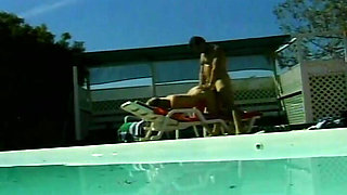 Blonde bombshell fucked by the pool