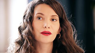 Subil Arch in seductive lingerie and pantyhose, showcasing her charm.