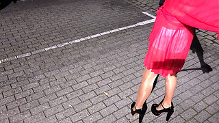 I'm wearing sexy higheels and a transparent dress that I piss in