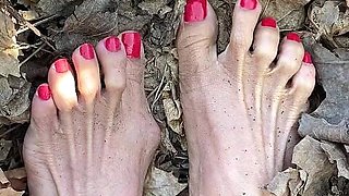 Melove Sexy Small Feet with Red Toe Nails in Leaves