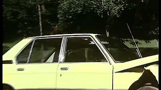 Retro girl gets fucked on top of a driving car