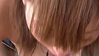 Horny Japanese teacher plays with her pussy and blows a guy with hairy dick in the classroom