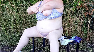 Stepmom in the Park Undressing and Masturbating on a Bench