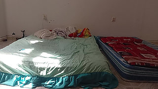 Mexican mother-in-law cleaning guest room in thong