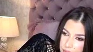 Brunette seductress working her big boobs and hot ass