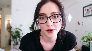 Small titted brunette Sharron with glasses masturbates