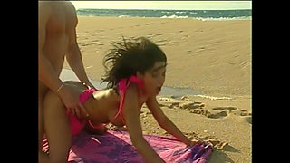 Sex on the Beach for a Young Skinny Brunette with a Big Dick