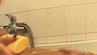 Big Boobed German Slut Enjoys Solo Action in the Shower