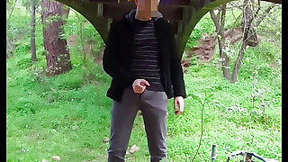 Jacking off Outdoors Under a Bridge and Cumming