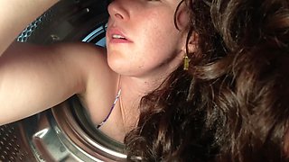 A hot brunette girlfriend gets stuck and banged in a washing machine