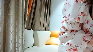 Cute amateur asian web cam girl playing with her toy
