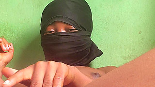 Naughty African babe touching and fingering herself when she is  alone