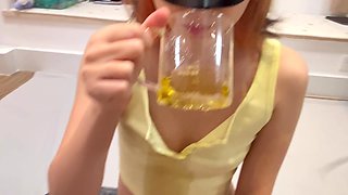 Filthy Asian Slut Uses a Glass to Drink Piss