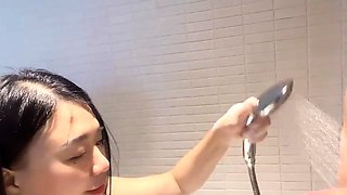 Japanese Mature Couple's Bathroom Sex Tape