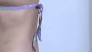 58-year-old Latina Wife Shows off in Swimsuit on the Beach