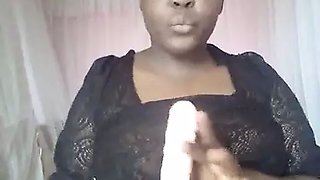 Clothed ebony masturbating