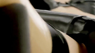 Rubberslut in the clinic masturbates with big dildo and deepthroats