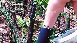 Peeing on a Toilet in the Woods