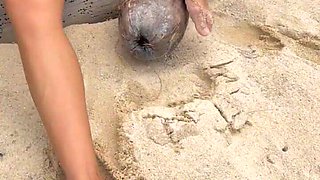 Masturbating on the Beach