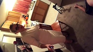Dominant blonde milf punishes a guy with her wonderful feet