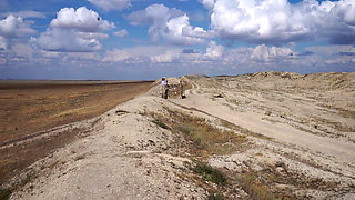 On Top of Hill with Red Flag