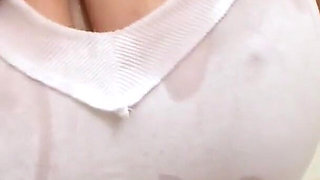 Classy redhead Eden Mor oils up her big natural tits in the bathtub