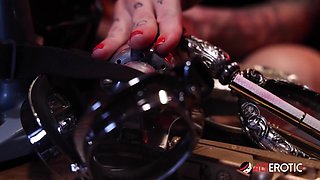 Kitt Jones gets so horny in her bunker she uses a powerful machine on her pussy! - AltErotic