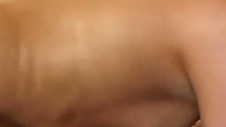 Brunette babe sucks cock in the car