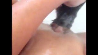 MILF Plays in the Tub with a Big Dildo