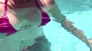 Artemisia Love dressed in a wondrous bathing suit in the outdoor jacuzzi