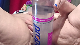 Big Bottle Plugged Clit Cunt