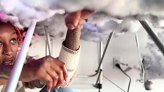 Pierced and tattooed boy sucking black cock from glory hole