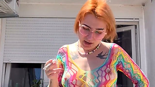 Smoking in a Rainbow Fishnet on the Balcony