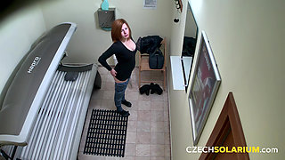 Czech Solarium 234: Young Redhead Shines in Solarium