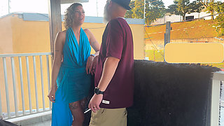 Strangers making out on a balcony during the party.