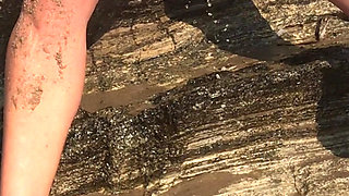 She pisses on the nudist beach