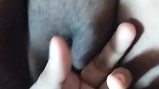Making Auntie's pussy wet by fingering it.