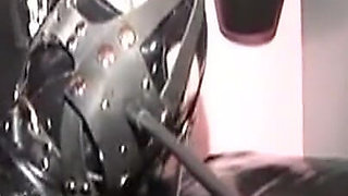 Dominatrix Trains Hooded Slave with Huge Dildo