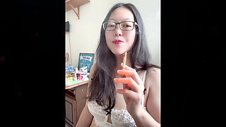 Real Smoking Asian MILF: Smoking While I Put on Lipstick and Flash My Milky 38C Breasts