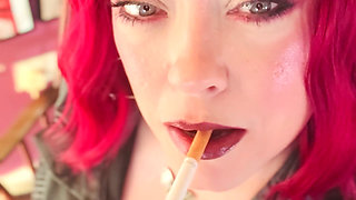 Your Mistress Tina Snua Dressed in Leather Chain Smoking 2 Cork Cigarettes