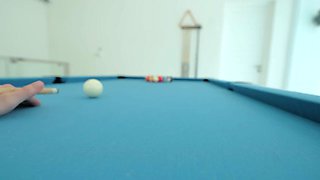 Young beauty shares intense pool table passion