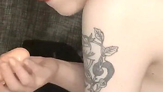 A Young Pregnant Girl in Glasses Sucks Fake Cocks