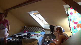 Five girls with their friend at home getting playful