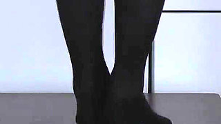 The Slave's Orgasm Under Mistress Cleo's Stocking Feet