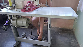 While Pedaling a Sewing Machine, It Gets Stuck, and She Receives Some Unexpected Help