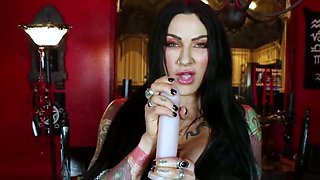 A tattooed dark haired doll guides your masturbation