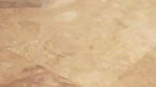 Horny Brunette Sucks Cock in Bathroom and Gets Facial