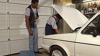 Threesome in the Car Garage with a Black Stud and Double Penetration