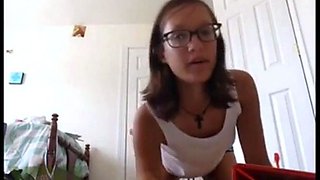 Skinny Brunette with Glasses Strips on Webcam