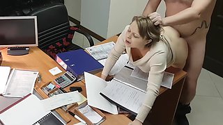 Hot office secretary sucks and rides her boss on the desk